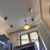 Фото ремонту кухні зі світлими фасадами і темної стільницею